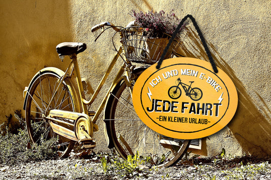 Blechschild ''Ich und mein E-Bike. Jede Fahrt ein kleiner Urlaub'' 18x14cm