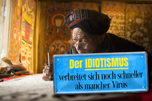 Blechschild ''Der Idiotismus verbreitet sich'' 28x12cm