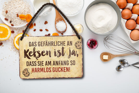 Blechschild ''Das gefährliche an Keksen ist ja.. harmlos gucken'' 18x12cm