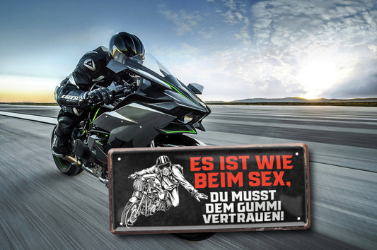 Blechschild ''Es ist wie beim Sex, dem Gummi vertrauen'' 28x12cm