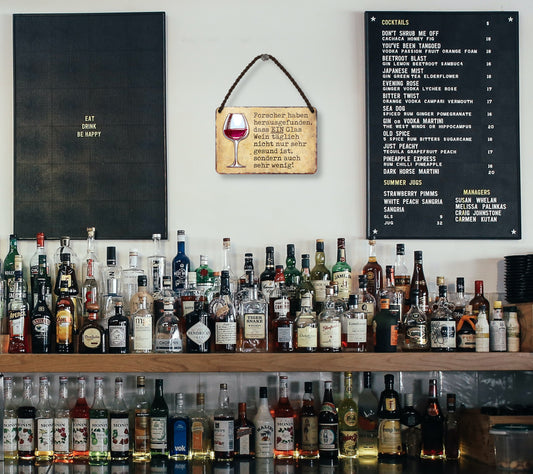 Tin sign "Researchers have found out.. a glass of wine a day" 18x12cm