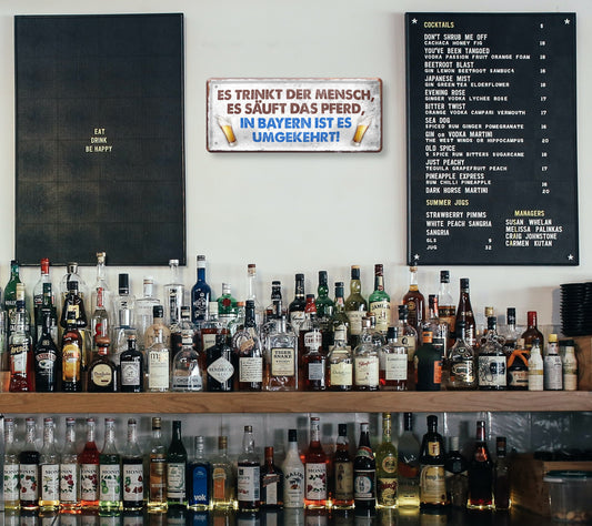 Blechschild ''Es trinkt der Mensch, säuft das Pferd, Bayern umgekehrt'' 28x12cm