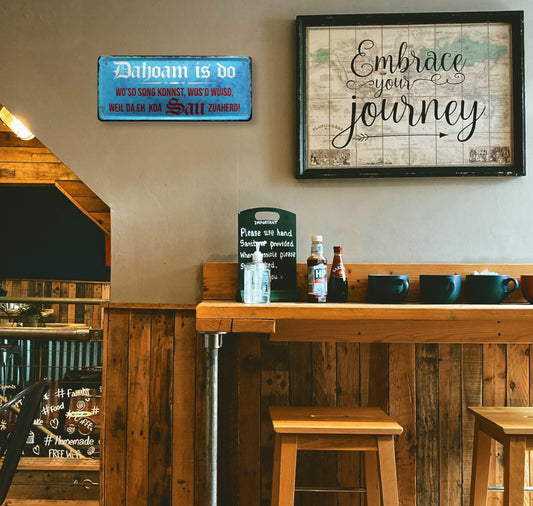 Tin sign "Dahoam is do where'so song konnst, wos'd wuisd" 28x12cm