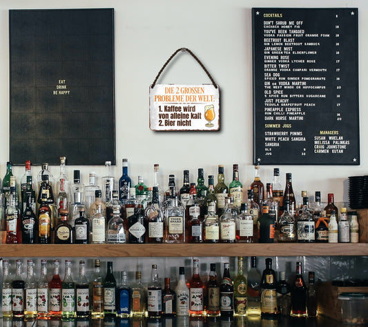 Blechschild ''Die 2 grossen Probleme der Welt 1. Kaffee wird von alleine kalt (weiß)'' 18x12cm