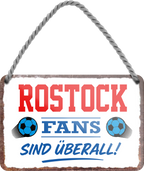 4252024255713		 ''Rostock Fans sind überall!''
Schilderstore24 Blechschilder sind perfekt als Geschenk zu Weihnachten, Geburtstage, Feiern, Partys, Grillabende, Namenstag, Feiertag, Mädelsabend, Hochzeit. Jederzeit stilvoll im Wohnzimmer, Partykeller, Garage, Praxis, Büro, Café, Hauseingang Fußball Mannschaft Verein Bolzen Ball sport liga kicken stadion freizeit