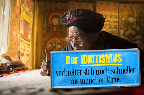 Blechschild ''Der Idiotismus verbreitet sich'' 28x12cm