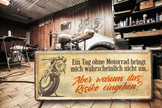 Blechschild ''Ein Tag ohne Motorrad das Risiko eingehen'' 28x12cm