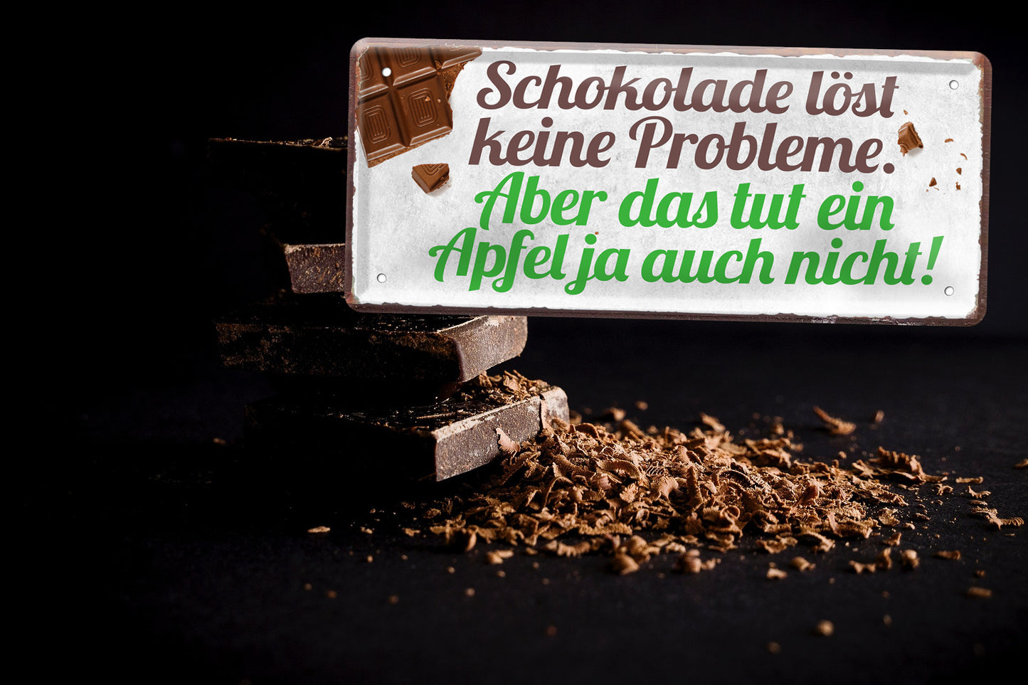 Blechschild ''Schokolade löst keine Probleme. Ein Apfel auch nicht'' 28x12cm