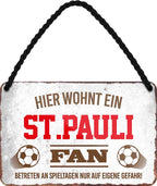 4252024203622 Schilderstore24 	Schilderstore24 Blechschilder sind perfekt als Geschenk zu Weihnachten, Geburtstage, Feiern, Partys, Grillabende, Namenstag, Feiertag, Mädelsabend, Hochzeit. Jederzeit stilvoll im Wohnzimmer, Partykeller, Garage, Praxis, Büro, Café, Hauseingang Fußball Mannschaft Verein Bolzen Ball sport liga kicken stadion freizeit ''St. Pauli Fan''		18x12cm