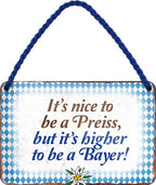 4252024201796 	Schilderstore24 Schilderstore24 Blechschilder sind perfekt als Geschenk zu Weihnachten, Geburtstage, Feiern, Partys, Grillabende, Namenstag, Feiertag, Mädelsabend, Hochzeit. Jederzeit stilvoll im Wohnzimmer, Partykeller, Garage, Praxis, Büro, Café, Hauseingang Sachse Bayern Schwäbisch Alm bayrisch sprache kultur tradition	 ''its nice ... to be a bayer''		18x12cm
