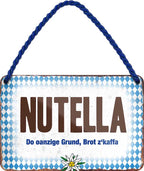 4252024201550 Schilderstore24 	Schilderstore24 Blechschilder sind perfekt als Geschenk zu Weihnachten, Geburtstage, Feiern, Partys, Grillabende, Namenstag, Feiertag, Mädelsabend, Hochzeit. Jederzeit stilvoll im Wohnzimmer, Partykeller, Garage, Praxis, Büro, Café, Hauseingang Sachse Bayern Schwäbisch Alm bayrisch sprache kultur tradition ''Bayrisch Nutella''		18x12cm