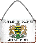 4252024201765 Schilderstore24 	Schilderstore24 Blechschilder sind perfekt als Geschenk zu Weihnachten, Geburtstage, Feiern, Partys, Grillabende, Namenstag, Feiertag, Mädelsabend, Hochzeit. Jederzeit stilvoll im Wohnzimmer, Partykeller, Garage, Praxis, Büro, Café, Hauseingang Sachse Bayern Schwäbisch Alm bayrisch sprache kultur tradition ''Ich bin en Sachse mei Gudsder''		18x12cm
