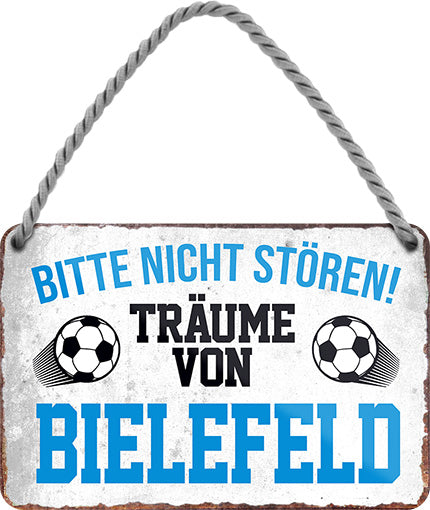 4252024204193 Schilderstore24 	Schilderstore24 Blechschilder sind perfekt als Geschenk zu Weihnachten, Geburtstage, Feiern, Partys, Grillabende, Namenstag, Feiertag, Mädelsabend, Hochzeit. Jederzeit stilvoll im Wohnzimmer, Partykeller, Garage, Praxis, Büro, Café, Hauseingang Fußball Mannschaft Verein Bolzen Ball sport liga kicken stadion freizeit ''Träume von Bielefeld''		18x12cm