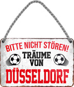 4252024204261 Schilderstore24 	Schilderstore24 Blechschilder sind perfekt als Geschenk zu Weihnachten, Geburtstage, Feiern, Partys, Grillabende, Namenstag, Feiertag, Mädelsabend, Hochzeit. Jederzeit stilvoll im Wohnzimmer, Partykeller, Garage, Praxis, Büro, Café, Hauseingang Fußball Mannschaft Verein Bolzen Ball sport liga kicken stadion freizeit ''Träume von Düsseldorf''		18x12cm