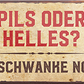 4252024240245	Schilderstore24	 ''Pils oder Helles'' Schilderstore24 Blechschilder sind perfekt als Geschenk zu Weihnachten, Geburtstage, Feiern, Partys, Grillabende, Namenstag, Feiertag, Mädelsabend, Hochzeit. Jederzeit stilvoll im Wohnzimmer, Partykeller, Garage, Praxis, Büro, Café, Hauseingang Alkohol Kasten Bier Saufen Getränk Bier Alkohol schaumkrone promille hopfen