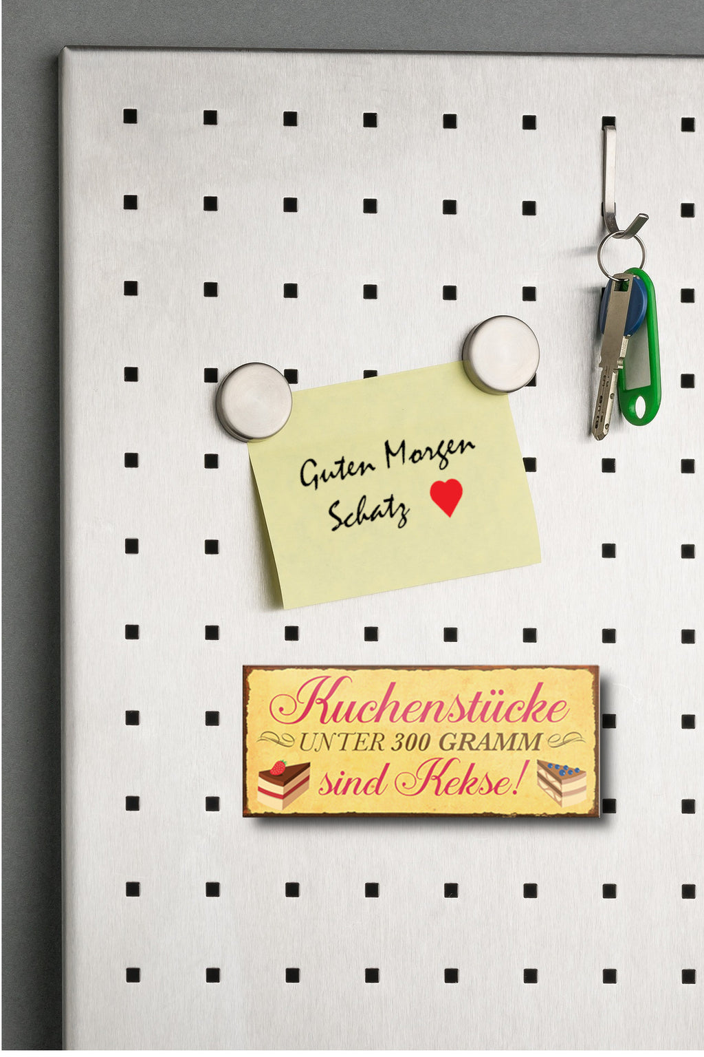 Magnet ''Kuchenstücke unter 300g sind Kekse'' 9,3x4cm