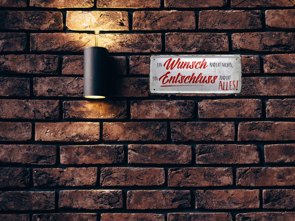 Blechschild ''Ein Wunsch ändert nichts, ein Entschluss ändert alles'' 28x12cm