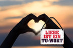 Blechschild ''Liebe ist ein Tu-Wort'' 18x12cm