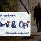 Blechschild ''Hier wohnen Omi & Opi'' 18x12cm